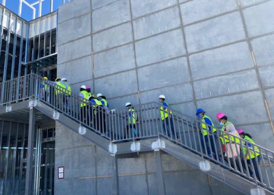Construction crew climbing stairs