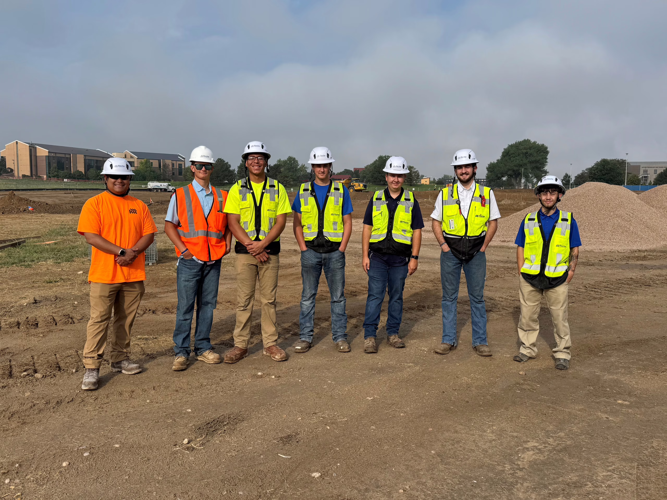 roche constructors team in hard hats working on a construction site